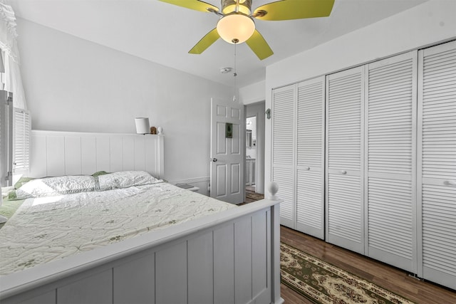 bedroom featuring dark hardwood / wood-style floors, a closet, and ceiling fan