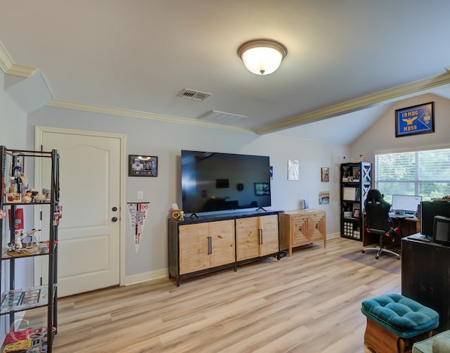 office with lofted ceiling, crown molding, and light hardwood / wood-style flooring