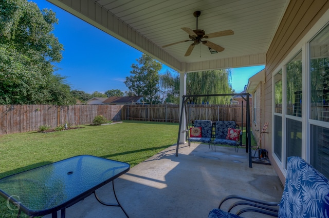 view of patio with ceiling fan