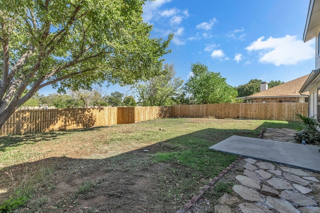 view of yard with a patio area