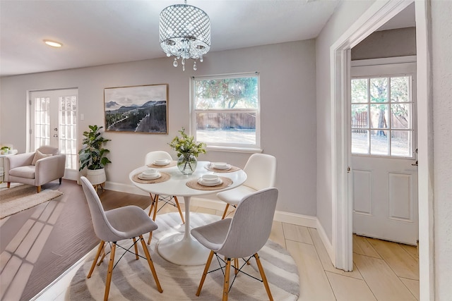 dining area with a chandelier