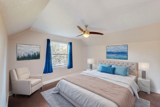 bedroom featuring lofted ceiling, dark hardwood / wood-style floors, and ceiling fan