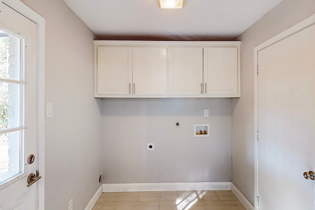 laundry area featuring cabinets, gas dryer hookup, washer hookup, and electric dryer hookup