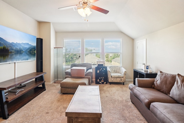 living room with lofted ceiling, light carpet, and ceiling fan