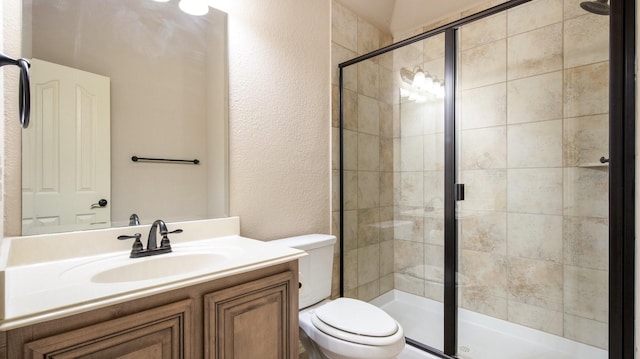 3123 Pamplona, Grand Prairie, TX 75054 - full bathroom featuring toilet, a textured wall, a stall shower, and vanity