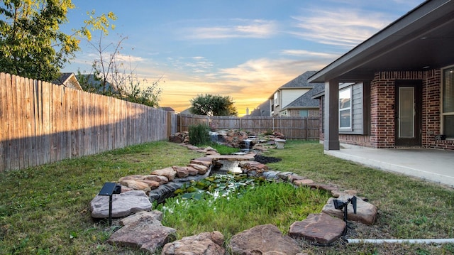 3123 Pamplona, Grand Prairie, TX 75054 - view of yard featuring a patio and a garden pond