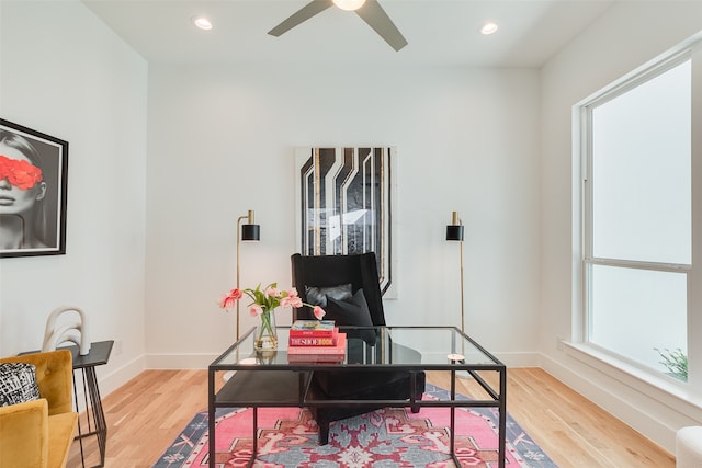 office featuring hardwood / wood-style flooring and ceiling fan