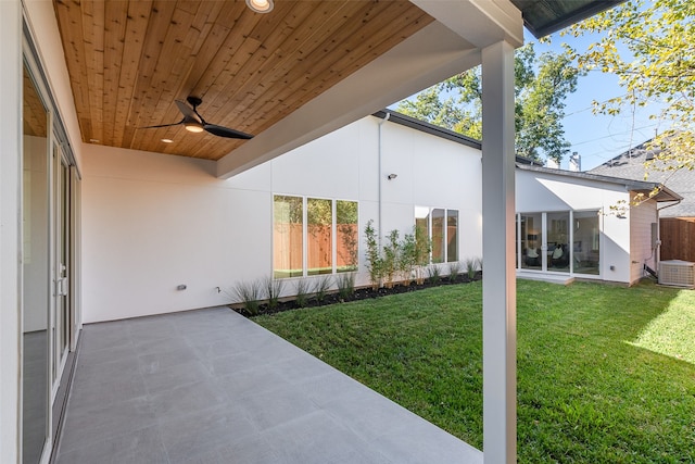 exterior space with ceiling fan