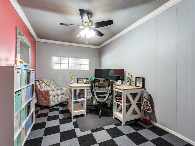 office with crown molding, wooden walls, and ceiling fan