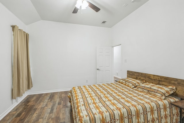 unfurnished bedroom with lofted ceiling, dark wood-type flooring, and ceiling fan