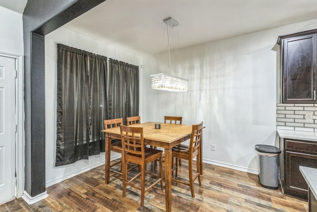 dining area featuring hardwood / wood-style floors