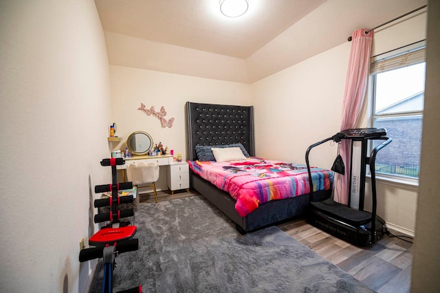 bedroom featuring dark hardwood / wood-style flooring