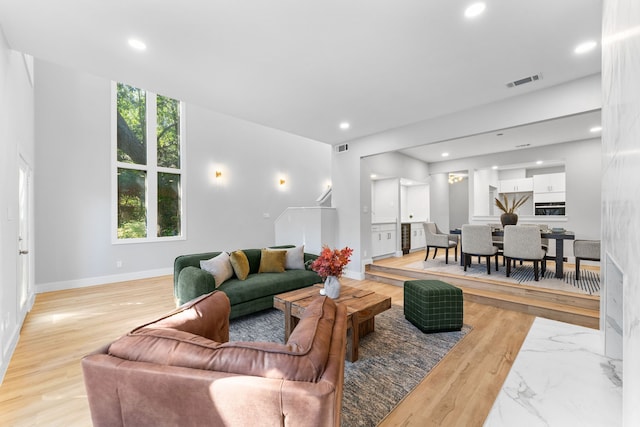 living room featuring light wood-type flooring