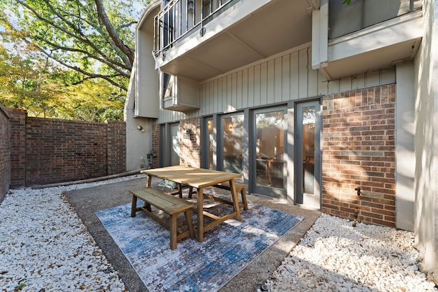 view of patio with a balcony