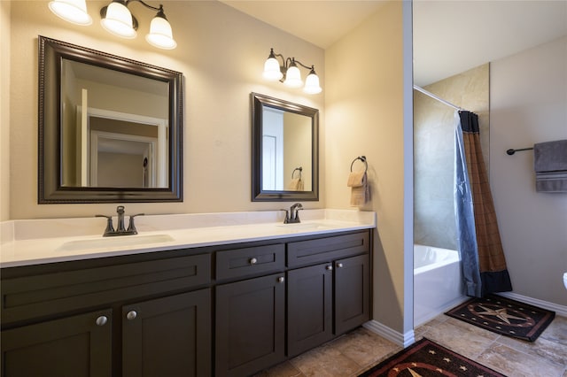 bathroom with vanity and shower / bathtub combination with curtain