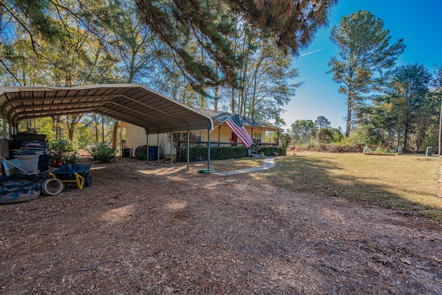 view of yard with a carport