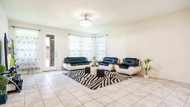 tiled living room with a healthy amount of sunlight