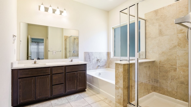 bathroom with vanity, plus walk in shower, and tile patterned floors