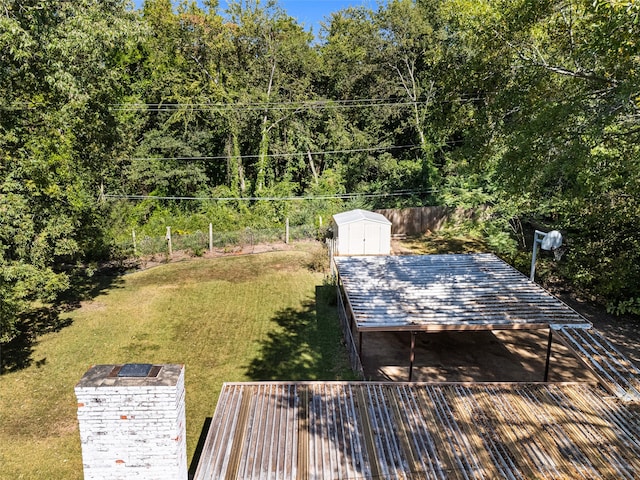 exterior space with a storage shed