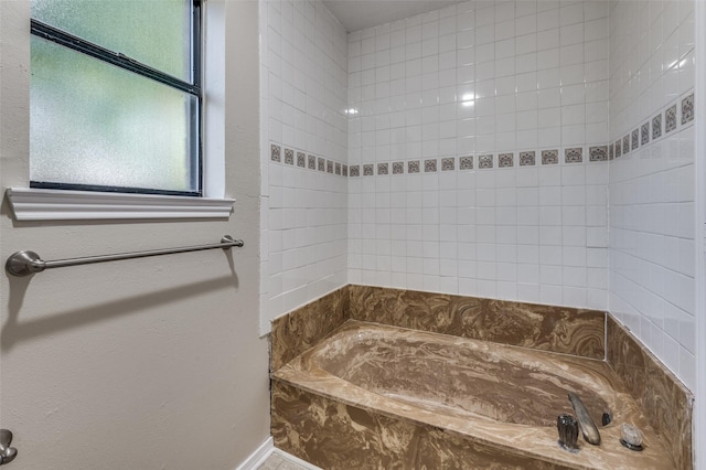 bathroom featuring a tub