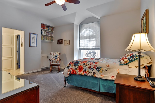 bedroom featuring ceiling fan, vaulted ceiling, and carpet floors