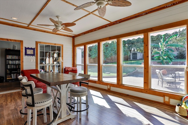 sunroom / solarium with ceiling fan