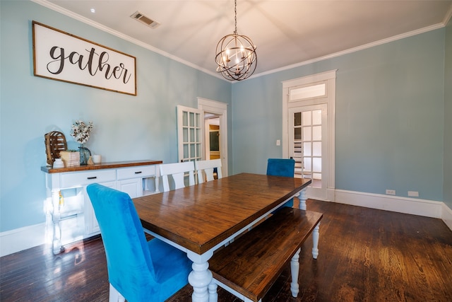 dining area with an inviting chandelier, crown molding, and dark wood-type flooring