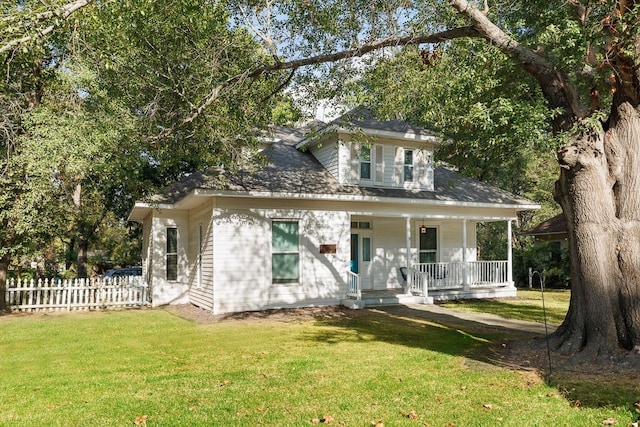 view of front of house featuring covered porch and a front lawn