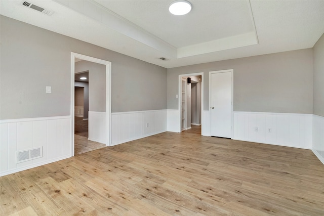 unfurnished room featuring light hardwood / wood-style flooring