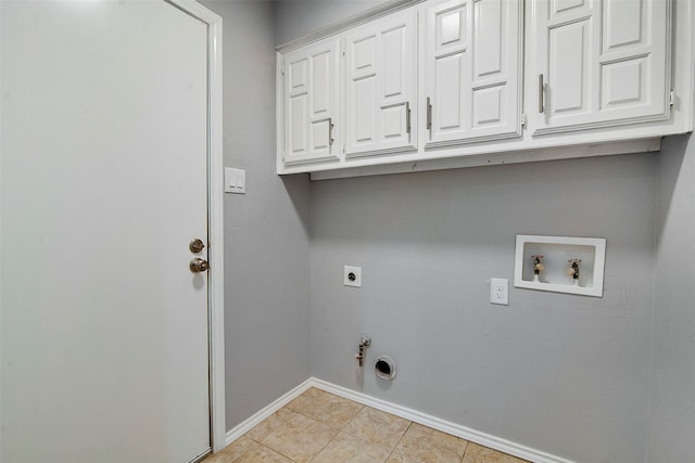 washroom featuring cabinets, light tile patterned floors, hookup for a washing machine, electric dryer hookup, and hookup for a gas dryer