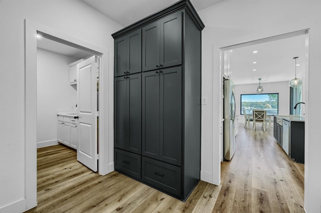 hall featuring light hardwood / wood-style flooring