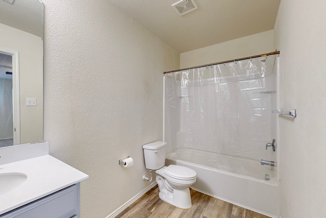 full bathroom featuring vanity, toilet, shower / tub combo, and hardwood / wood-style floors