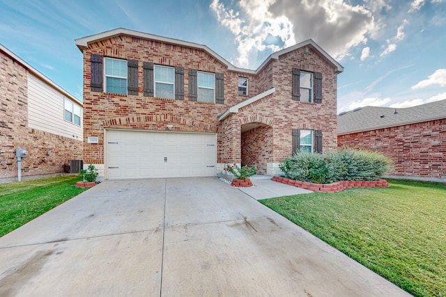 front facade with a front yard, a garage, and cooling unit