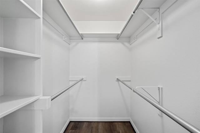 618 W Crawford St, Denison, TX 75020 - spacious closet with dark wood-type flooring