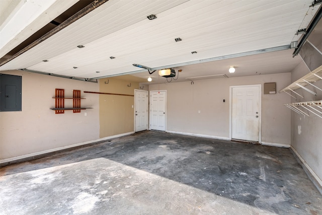 garage with electric panel and a garage door opener