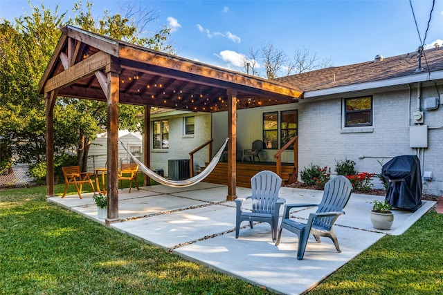 view of patio featuring central AC unit and a grill