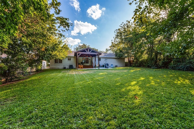 back of property featuring a patio area