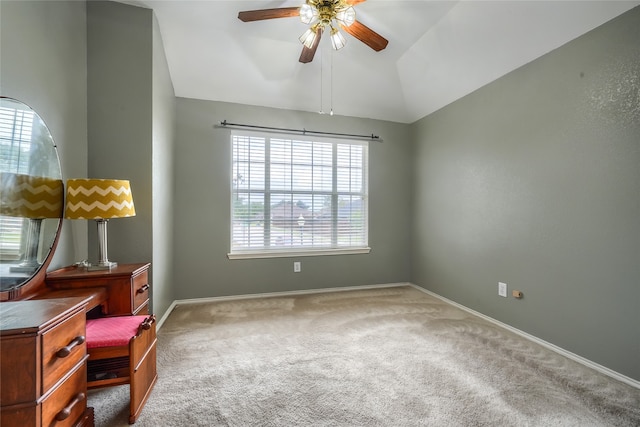 sitting room with carpet flooring, ceiling fan, and lofted ceiling