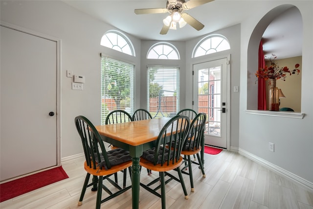 dining room featuring light hardwood / wood-style flooring and ceiling fan