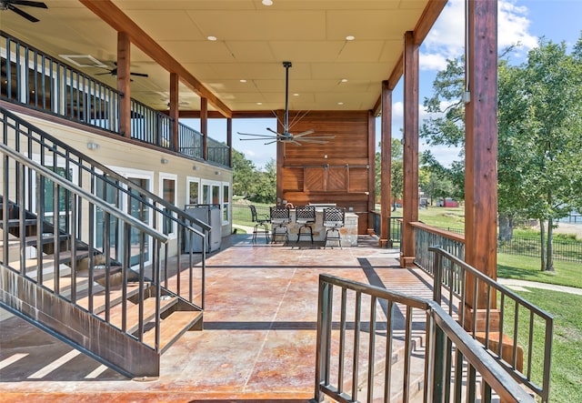 view of patio with ceiling fan