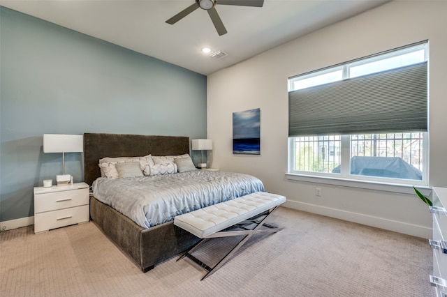 carpeted bedroom featuring ceiling fan