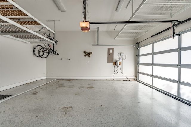 garage featuring a garage door opener and electric panel