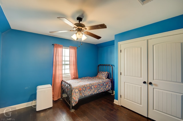 bedroom featuring a closet, ceiling fan, lofted ceiling, and dark hardwood / wood-style floors