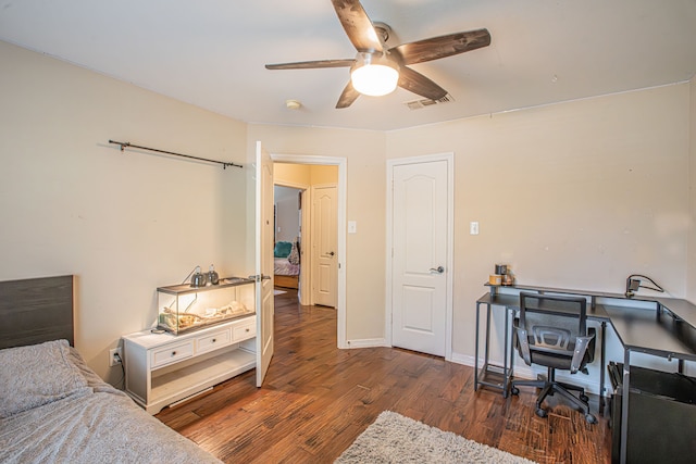 bedroom featuring dark wood-type flooring and ceiling fan