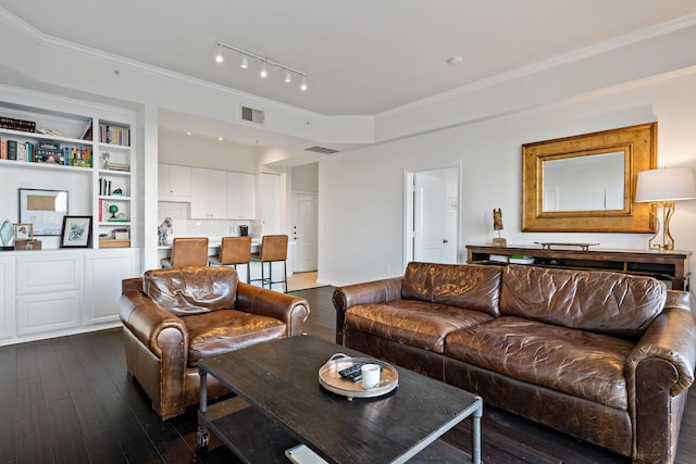 living room featuring ornamental molding and dark wood-type flooring