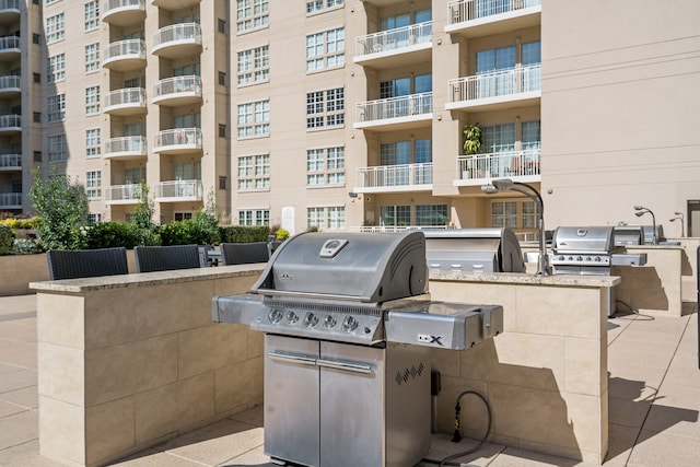 view of patio with a grill and exterior kitchen