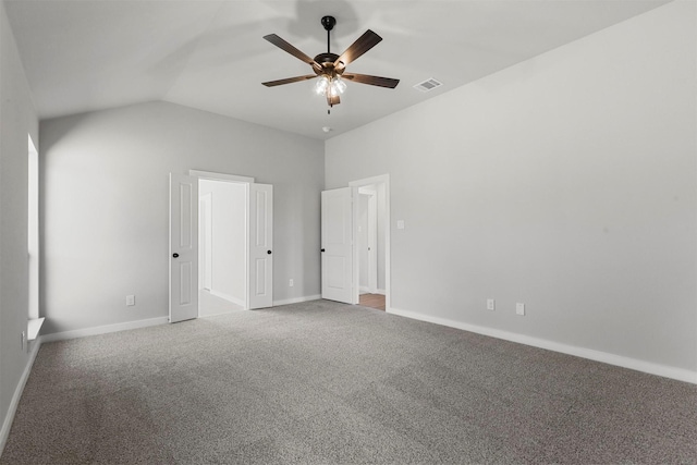 unfurnished bedroom with ceiling fan, carpet, and high vaulted ceiling