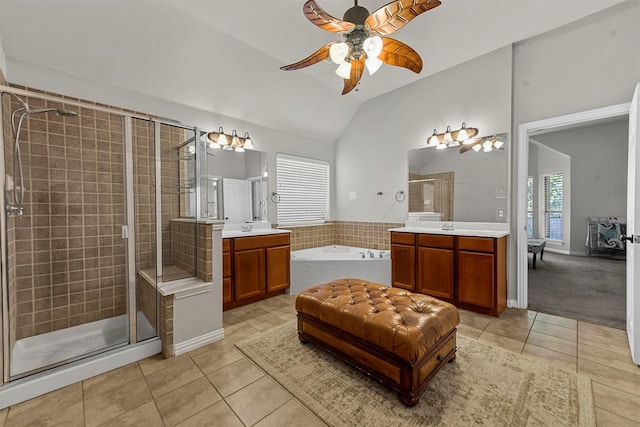 bathroom with ceiling fan, tile patterned flooring, and vanity