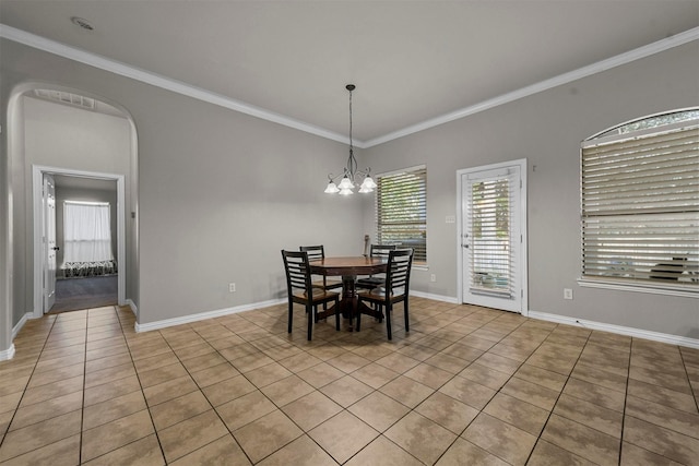 unfurnished dining area with crown molding and light tile patterned floors