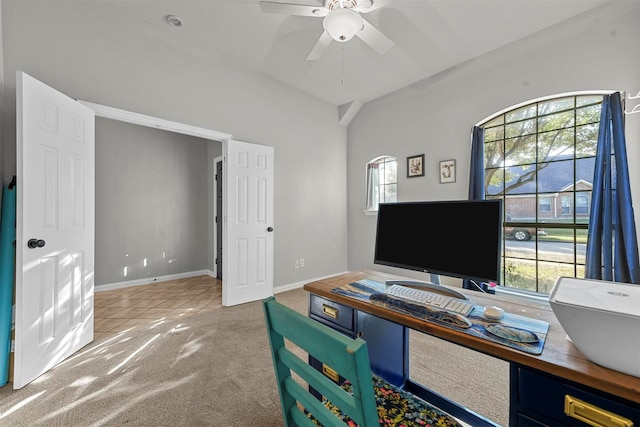 home office with carpet floors, ceiling fan, and a wealth of natural light